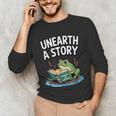 Unearth a Story Frog Reading a Book Summer 2026 Unisex Long Sleeve T-Shirt