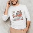 Book Lovers Winter Sleighing Through Stories Tee Premium Tri-Blend Unisex Long Sleeve T-Shirt