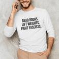 Read Books Lift Weights Fight Fascists Premium Tri-Blend Unisex Long Sleeve T-Shirt Read Books Lift Weights Fight Fascists Premium Tri-Blend Unisex Long Sleeve T-Shirt