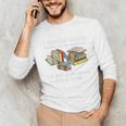 I Rescue Book Trapped In The Bookstore I'm Not A Hoarder Premium Tri-Blend Unisex Long Sleeve T-Shirt I Rescue Book Trapped In The Bookstore I'm Not A Hoarder Premium Tri-Blend Unisex Long Sleeve T-Shirt