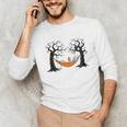 Skeleton Reading Book In Hammock Halloween Reader Unisex Long Sleeve T-Shirt
