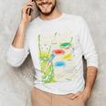 Superman Kryptonite Handbook Premium Tri-Blend Unisex Long Sleeve T-Shirt