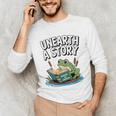 Unearth a Story Frog Reading a Book Summer 2026 Premium Tri-Blend Unisex Long Sleeve T-Shirt