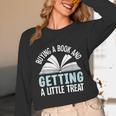 Buying A Book And Getting A Little Treat Unisex Long Sleeve T-Shirt Buying A Book And Getting A Little Treat Unisex Long Sleeve T-Shirt