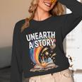 Unearth A Story Rainbow Treasure Book Unisex Long Sleeve T-Shirt Unearth A Story Rainbow Treasure Book Unisex Long Sleeve T-Shirt