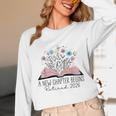 Floral Book A New Chapter Begins Retired 2026 Retirement Unisex Long Sleeve T-Shirt Floral Book A New Chapter Begins Retired 2026 Retirement Unisex Long Sleeve T-Shirt