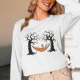 Skeleton Reading Book In Hammock Halloween Reader Unisex Long Sleeve T-Shirt