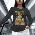 Unearth a Story Triceratops Dinosaur Reading Books Cute Dino Unisex Long Sleeve T-Shirt