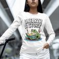 Unearth a Story Frog Reading a Book Summer 2026 Premium Tri-Blend Unisex Long Sleeve T-Shirt