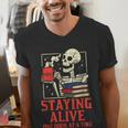 Staying Alive One Book At A Time Skeleton Reading Librarian Men's V-Neck T-Shirt Staying Alive One Book At A Time Skeleton Reading Librarian Men's V-Neck T-Shirt