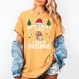 Christmas Tee Most Likely To Read A Book On Christmas Women's Comfort Colors T-Shirt Mustard Christmas Tee Most Likely To Read A Book On Christmas Women's Comfort Colors T-Shirt Mustard