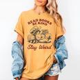 Read Books Be Kind Stay Weird Bookish Cowboy Reading Raccoon Women's Comfort Colors T-Shirt Mustard