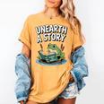 Unearth a Story Frog Reading a Book Summer 2026 Women's Comfort Colors T-Shirt Mustard