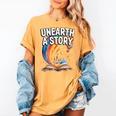 Unearth A Story Rainbow Treasure Book Women's Comfort Colors T-Shirt Mustard