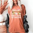 Most Likely To Read A Book On Christmas Snowman Family Women's Comfort Colors T-Shirt Yam