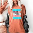 Threadless Grey Sky Chai Trans Book Pride Graphic Women's Comfort Colors T-Shirt Yam Threadless Grey Sky Chai Trans Book Pride Graphic Women's Comfort Colors T-Shirt Yam