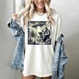 Bigfoot With Alien Reading A Book Bigfoot And UFO Women's Comfort Colors T-Shirt Ivory