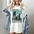 Godzilla Ocean Scene Comic Book Illustration Movie Monster Women's Comfort Colors T-Shirt Ivory Godzilla Ocean Scene Comic Book Illustration Movie Monster Women's Comfort Colors T-Shirt Ivory
