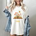 A New Chapter Begins Retired 2026 Floral Book Butterfly Tee Women's Comfort Colors T-Shirt Ivory A New Chapter Begins Retired 2026 Floral Book Butterfly Tee Women's Comfort Colors T-Shirt Ivory