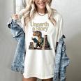 Unearth A Story Dinosaur Reading a Library Book Women's Comfort Colors T-Shirt Ivory
