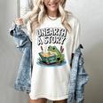Unearth a Story Frog Reading a Book Summer 2026 Women's Comfort Colors T-Shirt Ivory