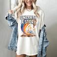 Unearth A Story Rainbow Treasure Book Women's Comfort Colors T-Shirt Ivory