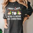 Most Likely To Read A Book On Christmas Snowman Family Women's Comfort Colors T-Shirt Pepper