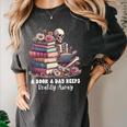 Reading A Book Per Day Keeps Reality Away Skeleton Books Women's Comfort Colors T-Shirt Pepper