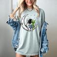 Astronaut Reading Book To Alien Moon Space Astronomy Women's Comfort Colors T-Shirt Denim Astronaut Reading Book To Alien Moon Space Astronomy Women's Comfort Colors T-Shirt Denim