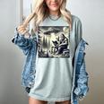 Bigfoot With Alien Reading A Book Bigfoot And UFO Women's Comfort Colors T-Shirt Denim