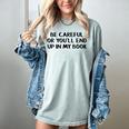 Be Careful Or You’Ll End Up In My Book Women's Comfort Colors T-Shirt Denim Be Careful Or You’Ll End Up In My Book Women's Comfort Colors T-Shirt Denim