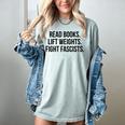 Read Books Lift Weights Fight Fascists Premium Tri-Blend Women's Comfort Colors T-Shirt Denim Read Books Lift Weights Fight Fascists Premium Tri-Blend Women's Comfort Colors T-Shirt Denim
