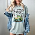 Unearth a Story Frog Reading a Book Summer 2026 Premium Tri-Blend Women's Comfort Colors T-Shirt Denim Unearth a Story Frog Reading a Book Summer 2026 Premium Tri-Blend Women's Comfort Colors T-Shirt Denim