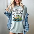 Unearth a Story Frog Reading a Book Summer 2026 Women's Comfort Colors T-Shirt Denim