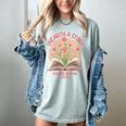 Women's Unearth a Story 2026 Summer Reading Program Flowers Book Women's Comfort Colors T-Shirt Denim Women's Unearth a Story 2026 Summer Reading Program Flowers Book Women's Comfort Colors T-Shirt Denim