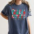 Groovy Christmas Most Likely To Read A Book On Christmas Women's Comfort Colors T-Shirt Moss Groovy Christmas Most Likely To Read A Book On Christmas Women's Comfort Colors T-Shirt Moss