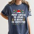 Most Likely To Read A Book On Christmas Matching Family Women's Comfort Colors T-Shirt Moss Most Likely To Read A Book On Christmas Matching Family Women's Comfort Colors T-Shirt Moss