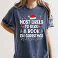 Most Likely To Read A Book On Christmas Matching Family Xmas Women's Comfort Colors T-Shirt Moss