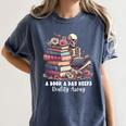Reading A Book Per Day Keeps Reality Away Skeleton Books Women's Comfort Colors T-Shirt Moss
