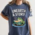Unearth a Story Frog Reading a Book Summer 2026 Premium Tri-Blend Women's Comfort Colors T-Shirt Moss Unearth a Story Frog Reading a Book Summer 2026 Premium Tri-Blend Women's Comfort Colors T-Shirt Moss