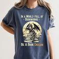 In a World Full Of Bookworms Be a Book Dragon Books Reading Women's Comfort Colors T-Shirt Moss