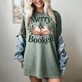 Merry And Booked Holiday Reading Winter Book Lover Premium Tri-Blend Women's Comfort Colors T-Shirt Berry