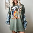 Unearth A Story Rainbow Treasure Book Women's Comfort Colors T-Shirt Berry