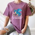 In A World Full Of Bookworms Be A Book Dragon Women's Comfort Colors T-Shirt Blue Jean In A World Full Of Bookworms Be A Book Dragon Women's Comfort Colors T-Shirt Blue Jean