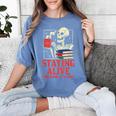 Staying Alive One Book At A Time Skeleton Reading Librarian Women's Comfort Colors T-Shirt Chalky Mint