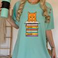 Cute Orange Tabby Cat Reading On Pile Of Books Women's Comfort Colors T-Shirt Violet Cute Orange Tabby Cat Reading On Pile Of Books Women's Comfort Colors T-Shirt Violet