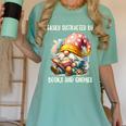 Easily Distracted By Books And Gnomes Book Reading Gnome Women's Comfort Colors T-Shirt Violet Easily Distracted By Books And Gnomes Book Reading Gnome Women's Comfort Colors T-Shirt Violet