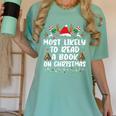Most Likely To Read A Book On Christmas Matching Family Women's Comfort Colors T-Shirt Violet Most Likely To Read A Book On Christmas Matching Family Women's Comfort Colors T-Shirt Violet