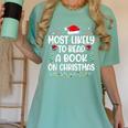 Most Likely To Read A Book On Christmas Matching Family Xmas Women's Comfort Colors T-Shirt Violet