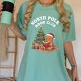 North Pole Book Club Gingerbread Christmas Reading Women's Comfort Colors T-Shirt Violet North Pole Book Club Gingerbread Christmas Reading Women's Comfort Colors T-Shirt Violet